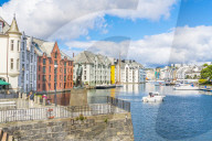 Fiskergutten or fisher boy statue on Brosundet Canal waterfront, Alesund, More og Romsdal county, Norway