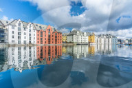Art Nouveau styled houses mirrored in Brosundet canal, Alesund, More og Romsdal county, Norway