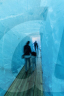 Tourists walking in the ice grotto inside Rhone Glacier, Gletsch, Canton of Valais, Switzerland