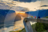 People admiring sunset from Stegastein viewpoint, aerial view, Aurlandsfjord, Sogn og Fjordane county, Norway