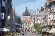Hanseatic league houses in the pedestrian zone with the main gate of Gdansk. Poland