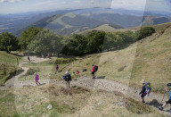 Christian pilgrims walking at Camino de Santiago (St. James' Way) route in Spain, Europe