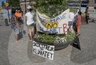 Swedish environmental activists protesting outside the Swedish parliament in Stockholm about the need for immediate action to combat climate change,Stockholm,Sweden