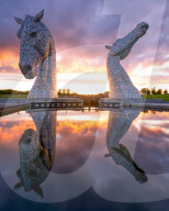 The Kelpies at sunset, Forth and Clyde Canal at Helix Park, Falkirk, Stirlingshire, Scotland, United Kingdom