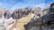 Hikers walking in Monte Lagazuoi, Dolomite mountains, Dolomites, Italy, Europe