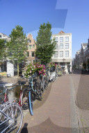 Bicycles on a bridge over the Herengracht canal, Amsterdam, Netherlands
