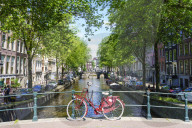 Bicycle on a bridge, Leidsegracht canal, Amsterdam, Netherlands