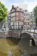 Old gabled buildings by a bridge on Keizersgracht, Amsterdam, Netherlands