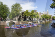 Tourist boat on a canal, Amsterdam, Netherlands