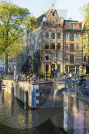Golden hour light on old gabled buildings, Brouwersgracht, canal, Amsterdam, Netherlands