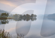 A misty autumn morning at Kinlochard, Loch Ard, Aberfoyle, The Lomond and trossachs National Park, Sterlingshire, Scotland.