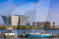 Boats moored in front of Titanic Belfast, Belfast, Northern Ireland, United Kingdom, Europe