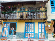 Housefront with man and girl, Filandia, Coffee Region, Colombia, South America