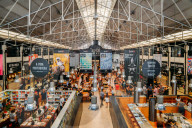 Time Out Market is a popular food hall located in Mercado da Ribeira at Cais do Sodre in Lisbon, Portugal