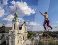 Highlining with Cathedral in the background, Urban Highline Festival, Lublin, Lublin Voivodeship, Poland