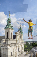 Highlining with Cathedral in the background, Urban Highline Festival, Lublin, Lublin Voivodeship, Poland