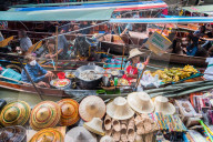 Dec 2017 - Ladies selling Fried Bananas at The Damnoen Saduak Floating River Market, Bangkok, Thailand