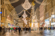 Christmas illuminations after dark on Vienna's city centre thoroughfare the Graben. Austria.