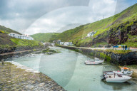 Views toward the village of Boscastle from the sea wall at the harbour entrance, on the Atlantic coast of Cornwall, England, UK.