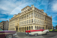 Old classic cars and The former Presidential Palace, The Museum of the Revolution in Old Havana, Cuba, West Indies, Caribbean
