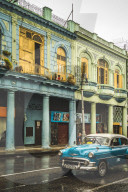 Turquoise vintage taxi in the rain, La Habana, Havana, Cuba, West Indies, Caribbean, Central America