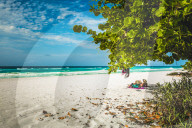 Tourists looking into the sea from Varadero beach, Hicacos Peninsula, Matanzas Province, Cuba, Central America
