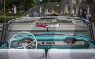 Vintage American taxi car interior, Havana at dusk, UNESCO, La Habana, Cuba, West Indies, Caribbean