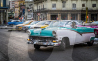 Colourful old American taxi cars parked in Havana at dusk, UNESCO, La Habana, Cuba, West Indies, Caribbean