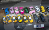 Aerial view of colourful old American taxi cars parked in Havana at dusk, La Habana, Cuba, West Indies, Caribbean