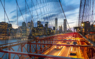 Manhattan skyline from the Brooklyn Bridge at night, New York, United States of America, North America
