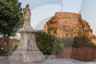 Statue of Count Schulenburg with the old fortress of Corfu Town (Kerkyra) in the background at sunset, Corfu, Greece, Europe