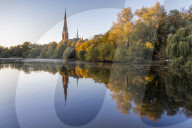 St. Gertrud Church at Kuhmuehlenteich in the Uhlenhorst district during autumn, Hamburg, Germany, Europe