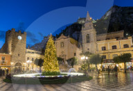 San Guiseppe church and the clock tower gate at Piazza IX Aprile during blue hour, Taormina, Sicily, Italy, Europe
