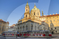 The famous tram no. 22 passing the Malostranske Namesti Square and St Nicholas Church, Prague, Bohemia, Czech Republic, Europe