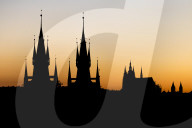 Silhouettes of Our Lady before Tyn Church and St. Vitus Cathedral at sunset, Prague, Bohemia, Czech Republic, Europe