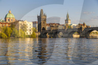 Charles Bridge and the Old Town Bridge Tower seen from the banks of Vltava River, Prague, Bohemia, Czech Republic, Europe