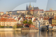 View from the banks of Vltava River over the Mala Strana district, Prague Castle and St. Vitus Cathedral, Prague, Czech Republic