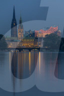 View from the Outer Alster Lake to the Elbphilharmonie, the town hall and St. Nikolai Memorial at dusk, Hamburg, Germany, Europe