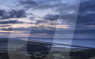Portland, the sweep of Chesil Beach, the inland lagoon the Fleet seen from the hill at Abbotsbury, near Weymouth, Dorset, UK