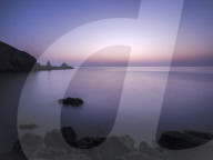 Cool dawn twilight look out into Torbay, Anstey's Cove, Torquay, Devon, UK