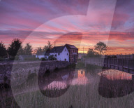 Dawn sky with two bridges over the River Clyst at Topsham, Devon, UK