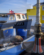 Fishing boat, nets and pots at The Point, Teignmouth, Devon, UK