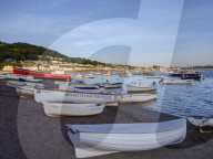 Boats at sunrise looking across Teign estuary to Shaldon at The Point, Teignmouth, Devon, UK