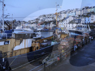 The colourful houses on the hillside above the harbour of Brixham, Devon, UK
