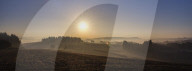Extensive dawn mist over the fields and Exe estuary, viewed from Mamhead, Starcross, Devon, UK