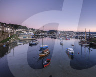 Twilight looking across the inner harbours at the fishing port of Newlyn, Cornwall, UK.