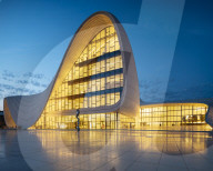 Exterior of Heydar Aliyev Building at night (designed by Zaha Hadid), Baku, Azerbaijan