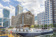 Barges in North Dock in Canary Wharf in London, England, United Kingdom, Europe
