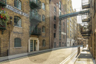 The historic Victorian streets and converted warehouses in Shad Thames in London, England, United Kingdom, Europe.
