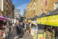 Food stalls in Petticoat Lane market in London, England, United Kingdom, Europe.